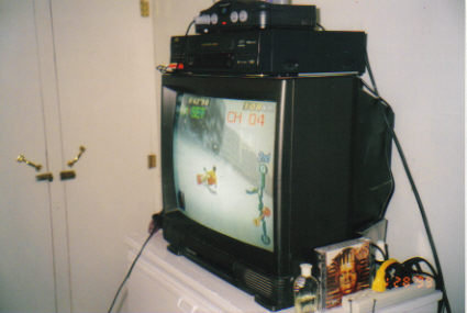 Late-1990s CRT television with a Nintendo 64 console displaying 1080° Snowboarding, representing early exposure to gaming hardware and hands-on technology.